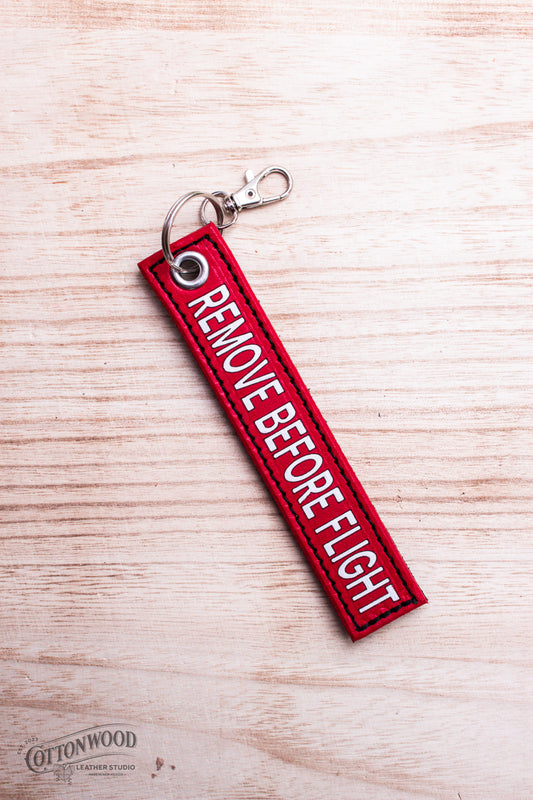 Remove Before Flight Keychain